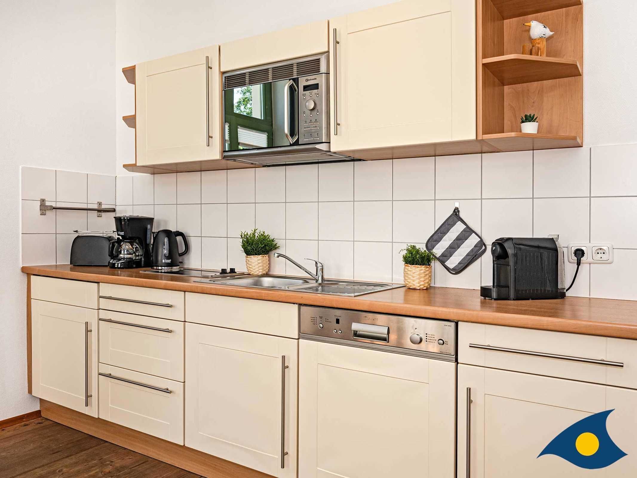 Fridge, microwave, dishwasher, coffee/tea maker