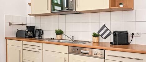 Fridge, microwave, dishwasher, coffee/tea maker