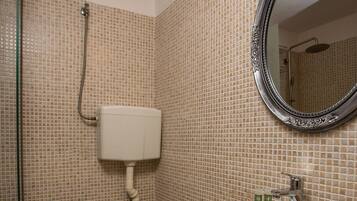 Combined shower/tub, hair dryer, towels, soap