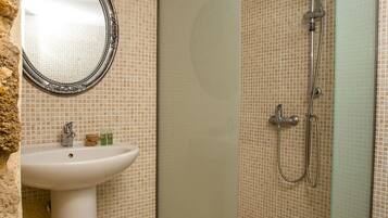 Combined shower/tub, hair dryer, towels, soap