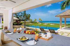 Outdoor dining - Perfect beachfront retreat of 5 bedrooms for rest & relaxation (Little Battaleys)