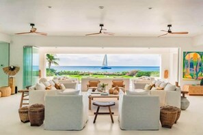 Interior - Perfect beachfront retreat of 5 bedrooms for rest & relaxation (Little Battaleys)