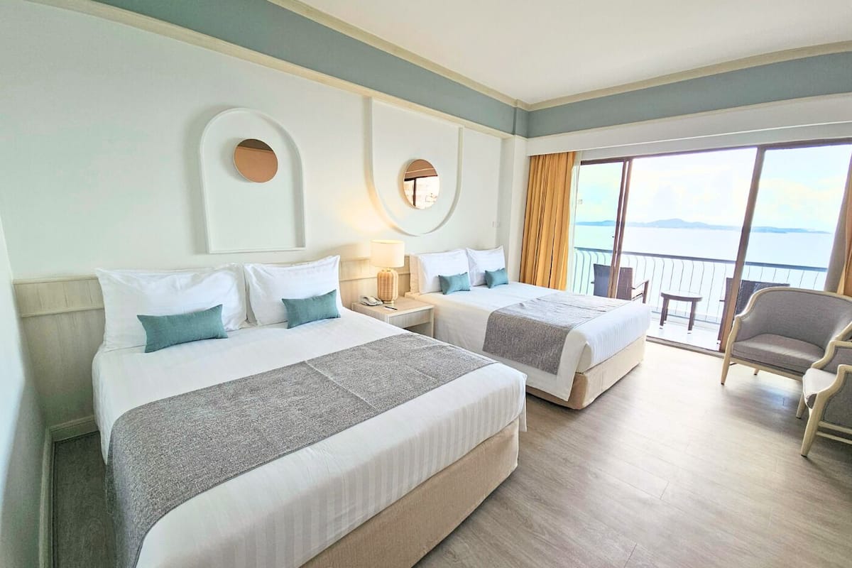 Superior Seaview Family Room | In-room safe, desk, blackout drapes, bed sheets