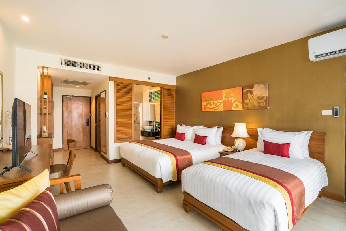 Deluxe Family Room (Unspecified View) | In-room safe, desk, blackout curtains, bed sheets