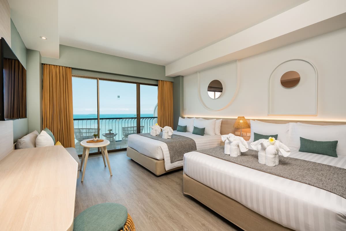 Deluxe Ocean View Family | In-room safe, desk, blackout curtains, bed sheets