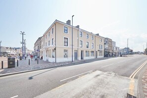 Stylish commercial building with a shop or cafe on the ground floor.