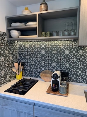 Fridge, microwave, stovetop, coffee/tea maker