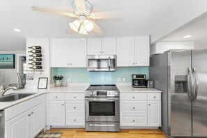 Fridge, microwave, dishwasher, coffee/tea maker