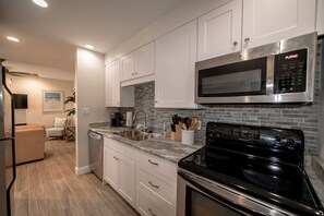 Fridge, microwave, oven, stovetop - UPDATED ONE BEDROOM, WATERFRONT CONDO IN THE FABULOUS MADEIRA BEACH YACHT CLUB (Madeira Beach)