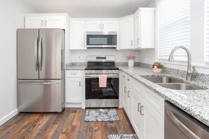 Fridge, microwave, oven, stovetop - Flamingo Chalet: Vintage Beach House  (Murrells Inlet)