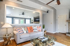 Smart TV, fireplace, table football, books