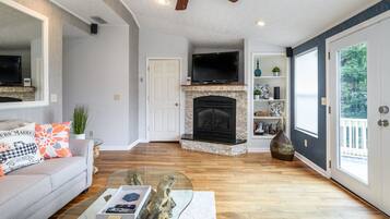 Smart TV, fireplace, foosball, books