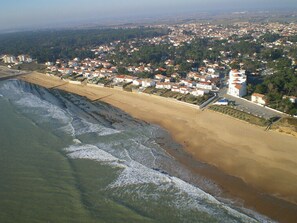 On the beach, sun loungers, beach towels