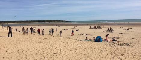 On the beach, sun-loungers, beach towels