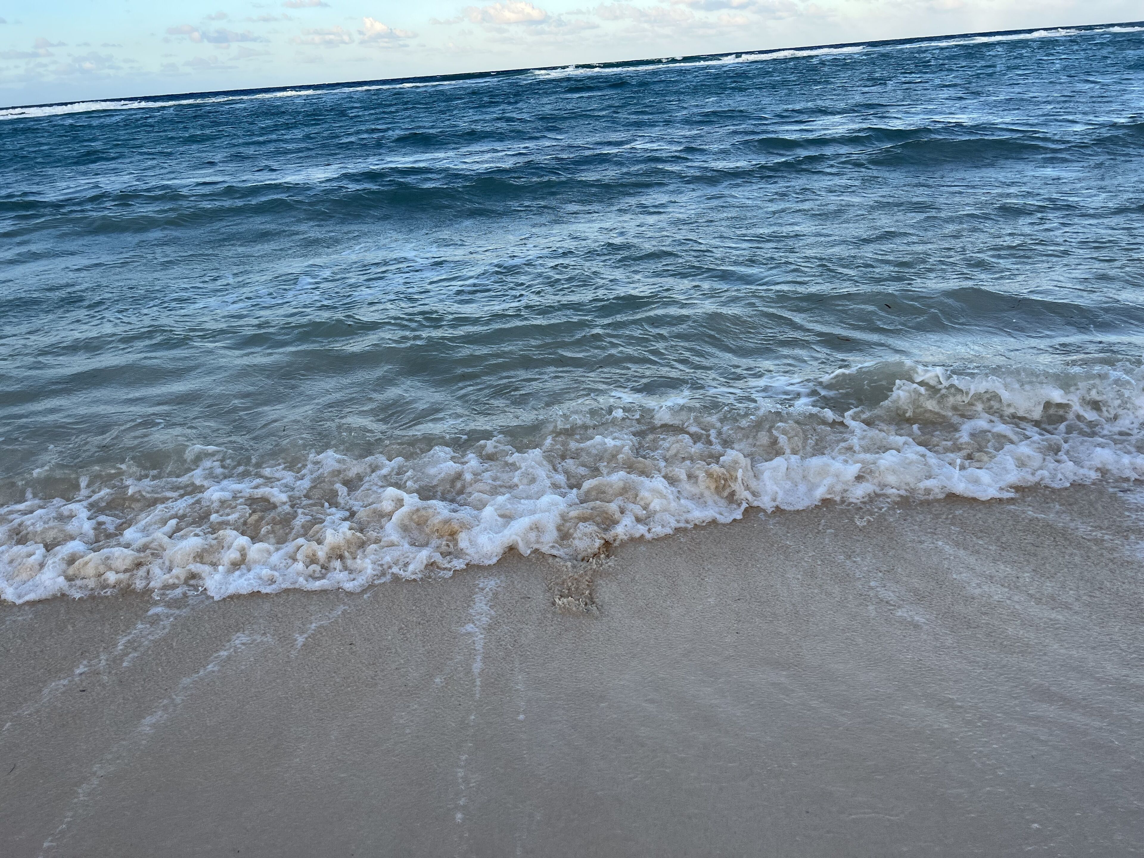 En la playa y toallas de playa 