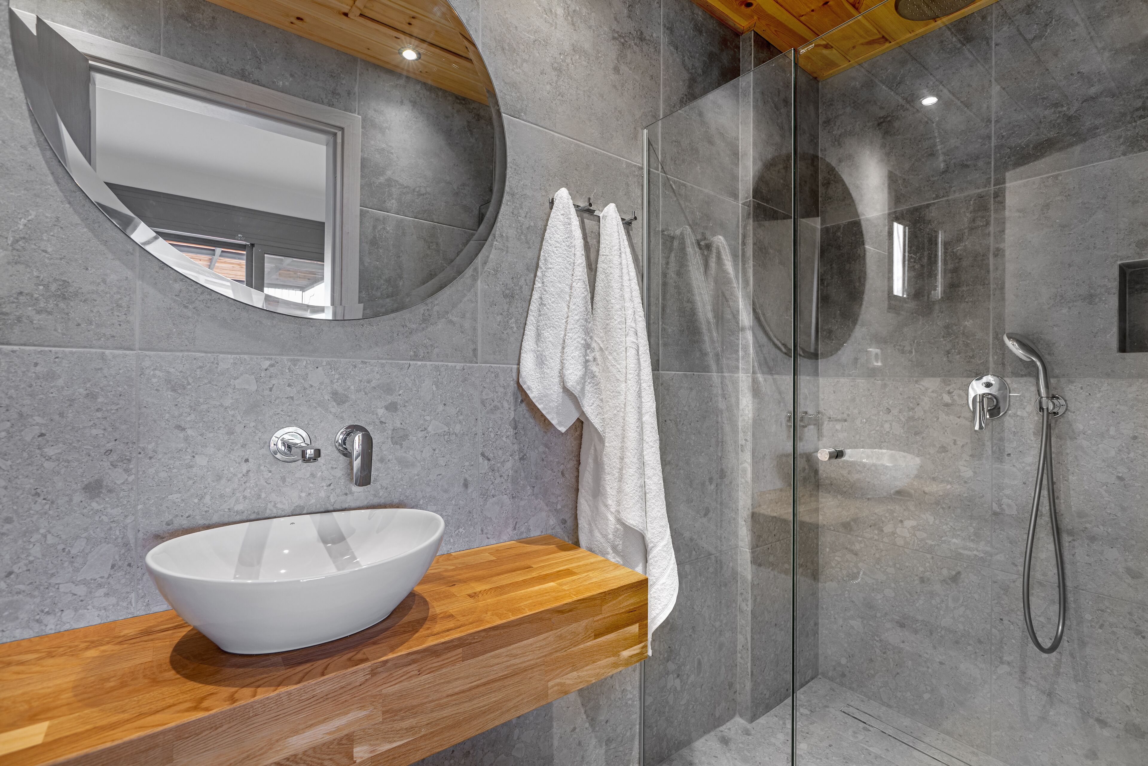 Shower, hair dryer, towels, toilet paper