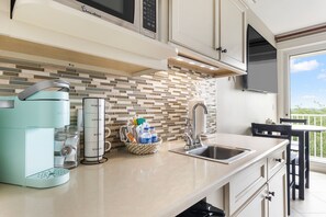 Fridge, microwave, coffee/tea maker, toaster