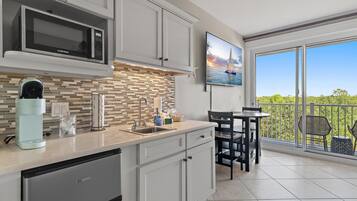 Fridge, microwave, coffee/tea maker, toaster