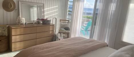 cozy bed with beach views awaits you!