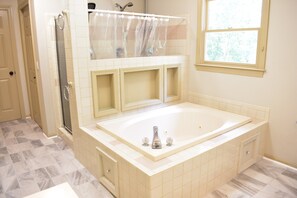 Combined shower/tub, hair dryer, towels, soap