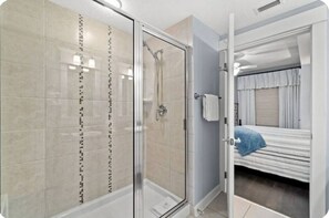 Combined shower/tub, hair dryer, towels, soap