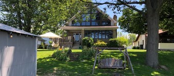 Waterfront with dock, firepit, and incredible views!!