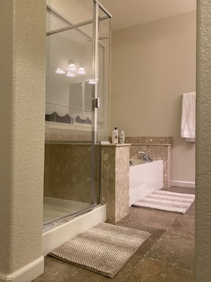 Combined shower/tub, hair dryer, towels, soap