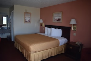 Economy Single Room, Non Smoking | Blackout drapes, iron/ironing board, free WiFi, bed sheets