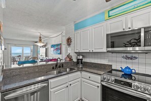 Fridge, microwave, oven, stovetop - Ocean Pier III 223-2BR/2BA Oceanfront Condo in Windy Hill (North Myrtle Beach)