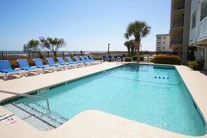 Outdoor pool, pool loungers - Ocean Pier III 223-2BR/2BA Oceanfront Condo in Windy Hill (North Myrtle Beach)
