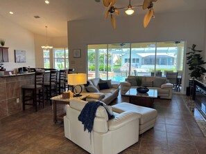 Smart TV, fireplace, books, stereo