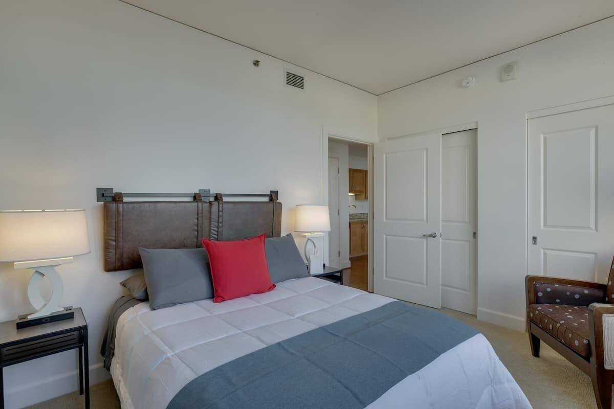 Premium bedding, memory foam beds, desk, laptop workspace