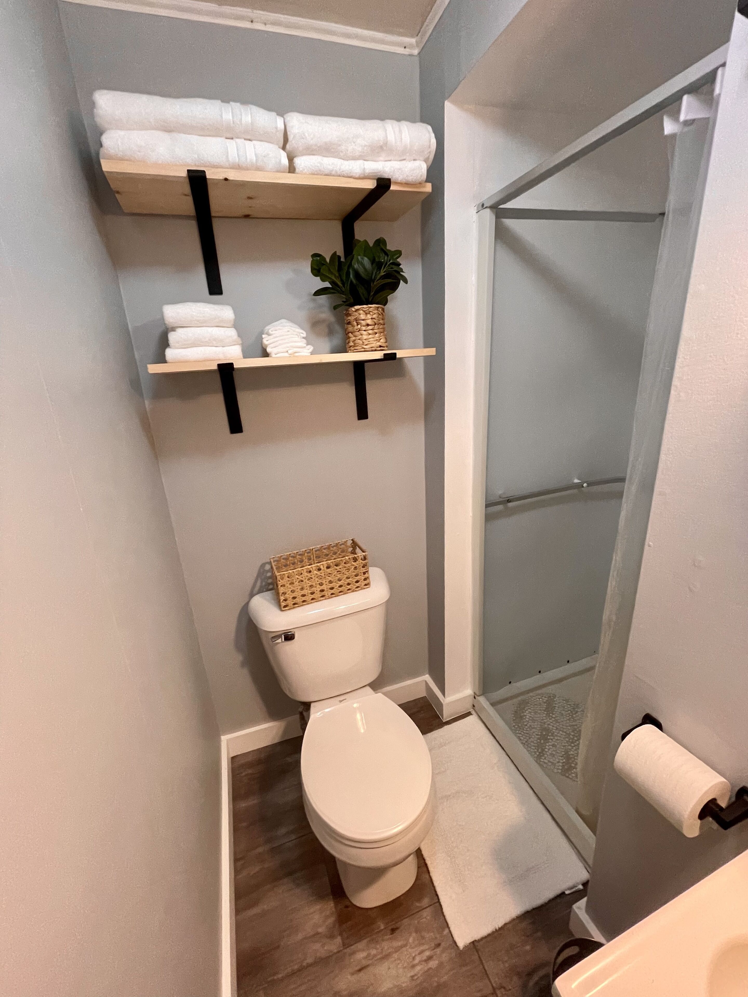 Shower, hair dryer, towels, soap
