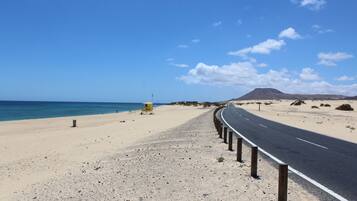 On the beach, beach towels