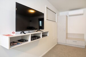 Blackout drapes, iron/ironing board, free WiFi, bed sheets