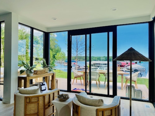 Brand new private executive home right on Big Cedar Lake with bonus loft!