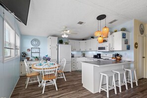 Fridge, microwave, oven, stovetop - WATERFRONT HOME 35' SEAWALL & DOCK 2 Bedroom 2 Bath Vacation Rental  (Cudjoe Key)