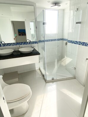 Shower, hair dryer, towels, soap
