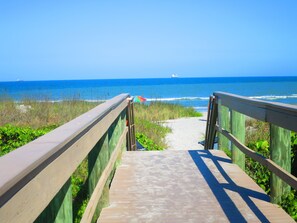On the beach, sun-loungers, beach towels