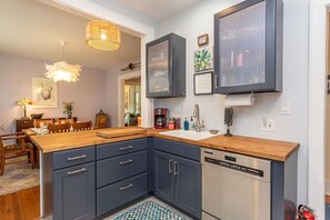 Enjoy meals in the kitchen with a dining area and stainless steel appliances.