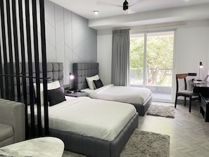 Familienapartment, 2 Einzelbetten, Küche | 1 Schlafzimmer, Zimmersafe, individuell dekoriert