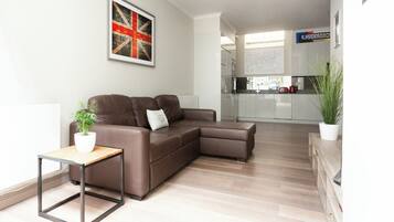 Apartment (2 Bedrooms) | Living area | TV, offices