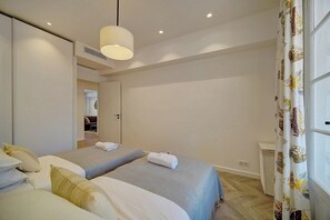 2 slaapkamers, een strijkplank/strijkijzer, gratis wifi, beddengoed