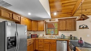Unclassified image, 4 of 15, button - Cozy peaceful cabin with games, massage chair and fire pit! Bring your kayaks!!  (Golden)
