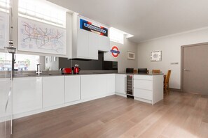 Fridge, microwave, dishwasher, coffee/tea maker