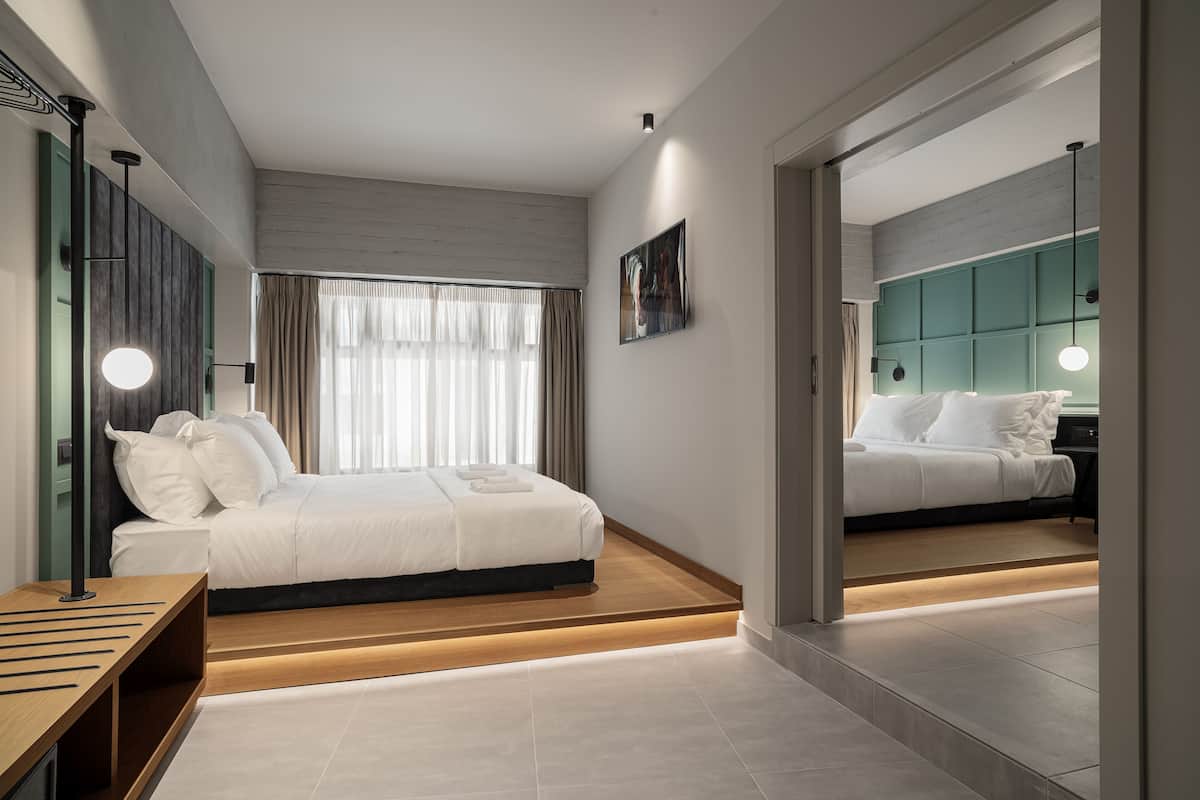 Deluxe Suite, 2 Bedrooms, Connecting Rooms | 1 bedroom, premium bedding, minibar, in-room safe