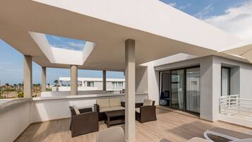 Bungalow, 3 Bedrooms, Sea View (Terrace) | In-room safe, desk, laptop workspace, iron/ironing board