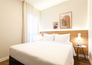 Suíte estúdio conforto | Espaço de trabalho para notebook, cortinas blackout, Wi-Fi de cortesia