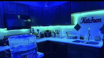 Microwave, dishwasher, coffee/tea maker, cookware/dishes/utensils