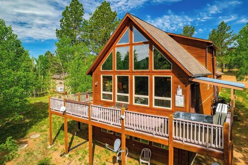 Family Cabin with looking up at back of Pikes Peak